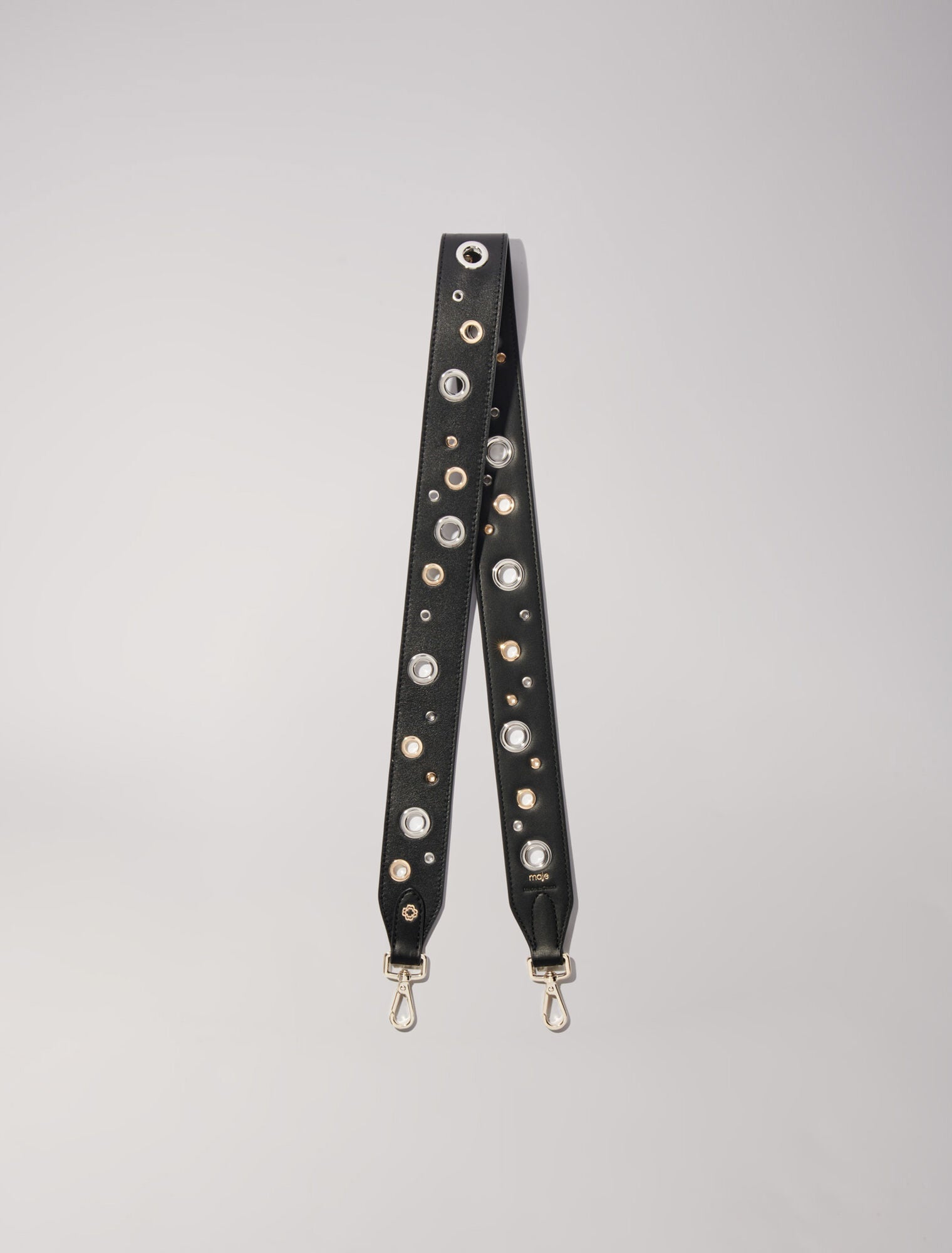 Leather shoulder strap with eyelets