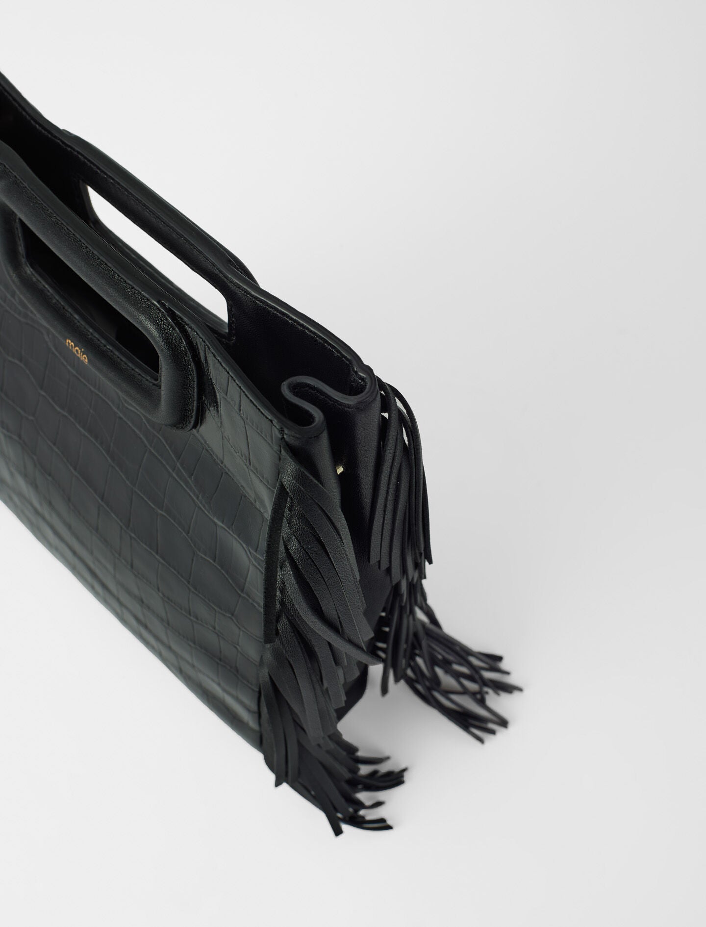 Black featured-fringed leather m bag