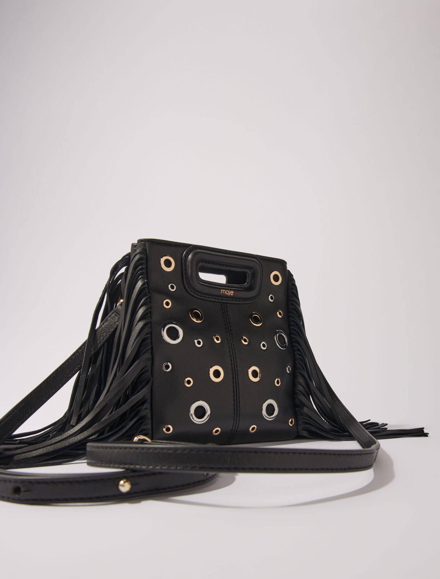 Black featured-Leather M mini bag with eyelets